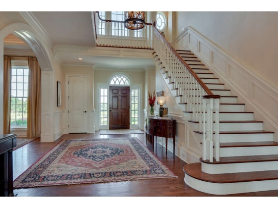 Elegant entry hall with grand staircase 