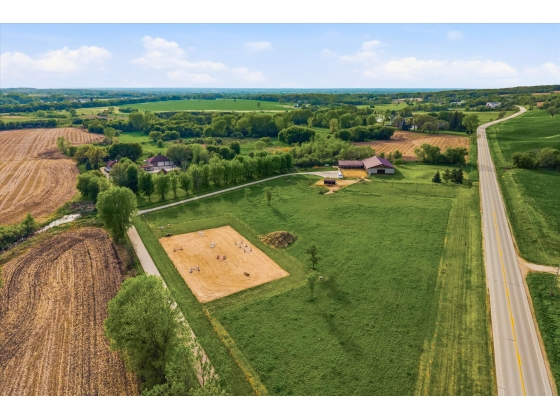 Outdoor arena, pastures, and barn