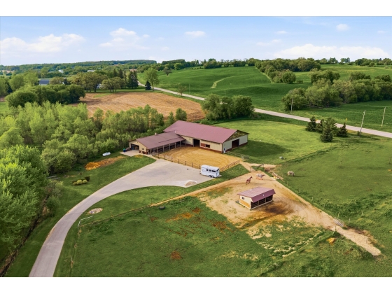 Barn, indoor arena, and pastures
