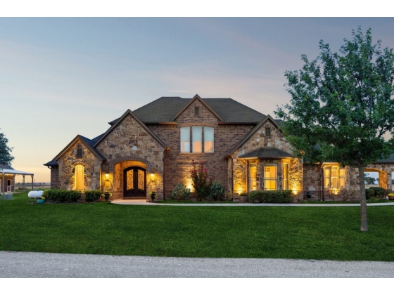 Custom country retreat situated on 25 peaceful acres.